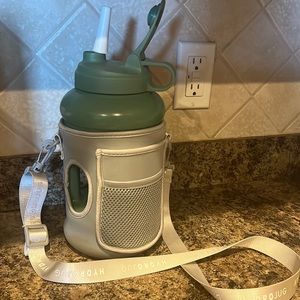 HydroJug with sleeve and straw.
